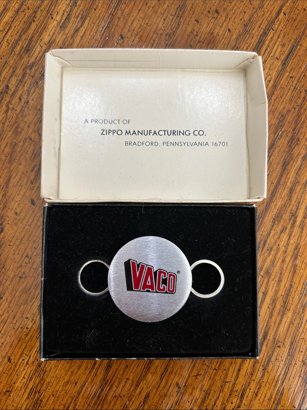 VACO Round Brushed Metal Keychain with Red Logo. Zippo key holder.